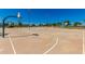 Outdoor basketball court with markings and lights at 1243 E Artesian Way, Gilbert, AZ 85234