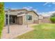 Backyard with patio, pergola, and partial home view at 9829 E Talon Ave, Mesa, AZ 85212