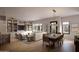 Open concept dining area with wood table and modern lighting at 19360 N 73Rd St # 1065, Scottsdale, AZ 85255