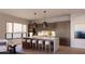 Modern kitchen with marble island and contemporary cabinetry at 19360 N 73Rd St # 1065, Scottsdale, AZ 85255