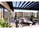 Spacious rooftop deck with seating, dining, and outdoor kitchen at 19360 N 73Rd St # 1065, Scottsdale, AZ 85255