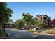 Gated entrance to the community with landscaping at 19360 N 73Rd St # C, Scottsdale, AZ 85255