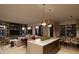 Open living space with contemporary furniture, a large TV, and an adjacent dining area at 19360 N 73Rd St # C, Scottsdale, AZ 85255