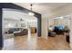 Open living room features a cozy fireplace and ample natural light at 14588 W Laurel Ln, Surprise, AZ 85379