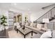 Bright living room featuring a neutral color palette and access to balcony at 7788 E Main St # 1002, Scottsdale, AZ 85251