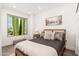 Cozy bedroom with a comfortable bed and large window at 7788 E Main St # 1002, Scottsdale, AZ 85251