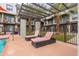 Relaxing poolside lounge chairs under a pergola at 7788 E Main St # 1002, Scottsdale, AZ 85251