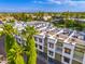 Aerial perspective highlighting townhomes with spacious rooftop patios and palm trees at 7788 E Main St # 1002, Scottsdale, AZ 85251