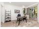 Home office with desk, shelving, and balcony access at 7788 E Main St # 1002, Scottsdale, AZ 85251