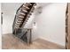 Modern staircase with wood and metal accents at 7788 E Main St # 1002, Scottsdale, AZ 85251