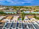 Aerial view of townhome community with private rooftop decks and pool at 7788 E Main St # 1002, Scottsdale, AZ 85251