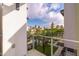 Private balcony overlooking the community pool and courtyard at 7788 E Main St # 1002, Scottsdale, AZ 85251