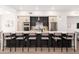 Modern kitchen with a large island and bar seating at 7788 E Main St # 1002, Scottsdale, AZ 85251