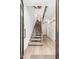 Modern wooden staircase with metal railing at 7788 E Main St # 1002, Scottsdale, AZ 85251