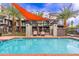 Enjoy the resort-style pool with a shade sail and comfortable seating at 7788 E Main St # 1002, Scottsdale, AZ 85251