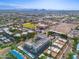 Aerial view highlighting a modern townhome development and its surrounding city landscape at 7788 E Main St # 1002, Scottsdale, AZ 85251