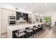 Modern kitchen with large island, stainless steel appliances, and open layout at 7788 E Main St # 1002, Scottsdale, AZ 85251
