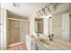 Bathroom with double vanity and walk-in shower at 9302 E Broadway Rd # 42, Mesa, AZ 85208