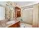 Bathroom with floral wallpaper and wood vanity at 9302 E Broadway Rd # 42, Mesa, AZ 85208