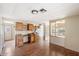 Kitchen area with wood cabinets and a built-in desk at 9302 E Broadway Rd # 42, Mesa, AZ 85208