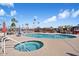 Resort-style pool and spa with comfortable seating and shade at 9302 E Broadway Rd # 42, Mesa, AZ 85208