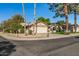 Home's exterior, showcasing landscaping and a corner lot at 12903 W Blue Sky Dr, Sun City West, AZ 85375