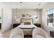 Spacious main bedroom with plush bed, ample natural light, and relaxing sitting area at 9622 W Villa Chula Dr, Peoria, AZ 85383