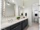 Double vanity bathroom with modern finishes and a separate toilet area at 9622 W Villa Chula Dr, Peoria, AZ 85383