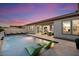 Spacious backyard with a beautiful pool and plenty of seating at 9622 W Villa Chula Dr, Peoria, AZ 85383
