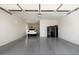 Attached garage with epoxy flooring and ample storage at 9622 W Villa Chula Dr, Peoria, AZ 85383