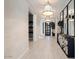 Modern home entryway with light wood floors and open concept at 9622 W Villa Chula Dr, Peoria, AZ 85383