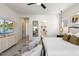 Main bedroom suite with large TV, sitting area, and walk-in closet at 9622 W Villa Chula Dr, Peoria, AZ 85383