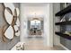 Spacious entryway with light floors and statement lighting at 9622 W Villa Chula Dr, Peoria, AZ 85383