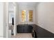 Home office with built-in desk and stylish wall art at 9622 W Villa Chula Dr, Peoria, AZ 85383