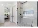 Elegant bathroom with a large walk-in shower and modern fixtures at 9622 W Villa Chula Dr, Peoria, AZ 85383