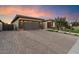 Elegant entryway with light tile flooring, high ceilings, and mirrors at 9622 W Villa Chula Dr, Peoria, AZ 85383