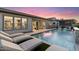 Beautiful backyard featuring a refreshing pool and comfortable lounge chairs at 9622 W Villa Chula Dr, Peoria, AZ 85383