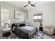 Spacious bedroom with a queen bed and stylish decor at 9622 W Villa Chula Dr, Peoria, AZ 85383