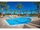 Community pool with a separate kiddie pool and lounge chairs at 10523 E Simone Ave, Mesa, AZ 85212