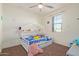 bedroom with a bunk bed and playful decor at 10523 E Simone Ave, Mesa, AZ 85212