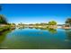 Scenic community lake with ducks and a wooden gazebo at 10523 E Simone Ave, Mesa, AZ 85212
