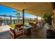 Relaxing patio with fire pit and comfortable seating at 10523 E Simone Ave, Mesa, AZ 85212