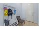 Bright entryway with a bench, shoe storage and coat hooks at 10523 E Simone Ave, Mesa, AZ 85212