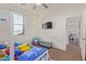 bedroom with a bunk bed, and a view into another bedroom at 10523 E Simone Ave, Mesa, AZ 85212