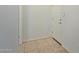 Light and bright foyer with neutral tile flooring at 10523 E Simone Ave, Mesa, AZ 85212