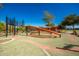 Modern playground with climbing wall and nets at 10523 E Simone Ave, Mesa, AZ 85212