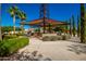 Outdoor firepit under a modern structure at 10523 E Simone Ave, Mesa, AZ 85212