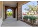 Covered porch with stone columns and a view of the neighborhood at 10523 E Simone Ave, Mesa, AZ 85212