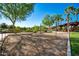 Community playground with play structures and wood-chip surface at 10523 E Simone Ave, Mesa, AZ 85212