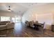 Bright dining area with a large wooden table and six chairs, and access to the backyard at 2057 E Marquette Dr, Gilbert, AZ 85234
